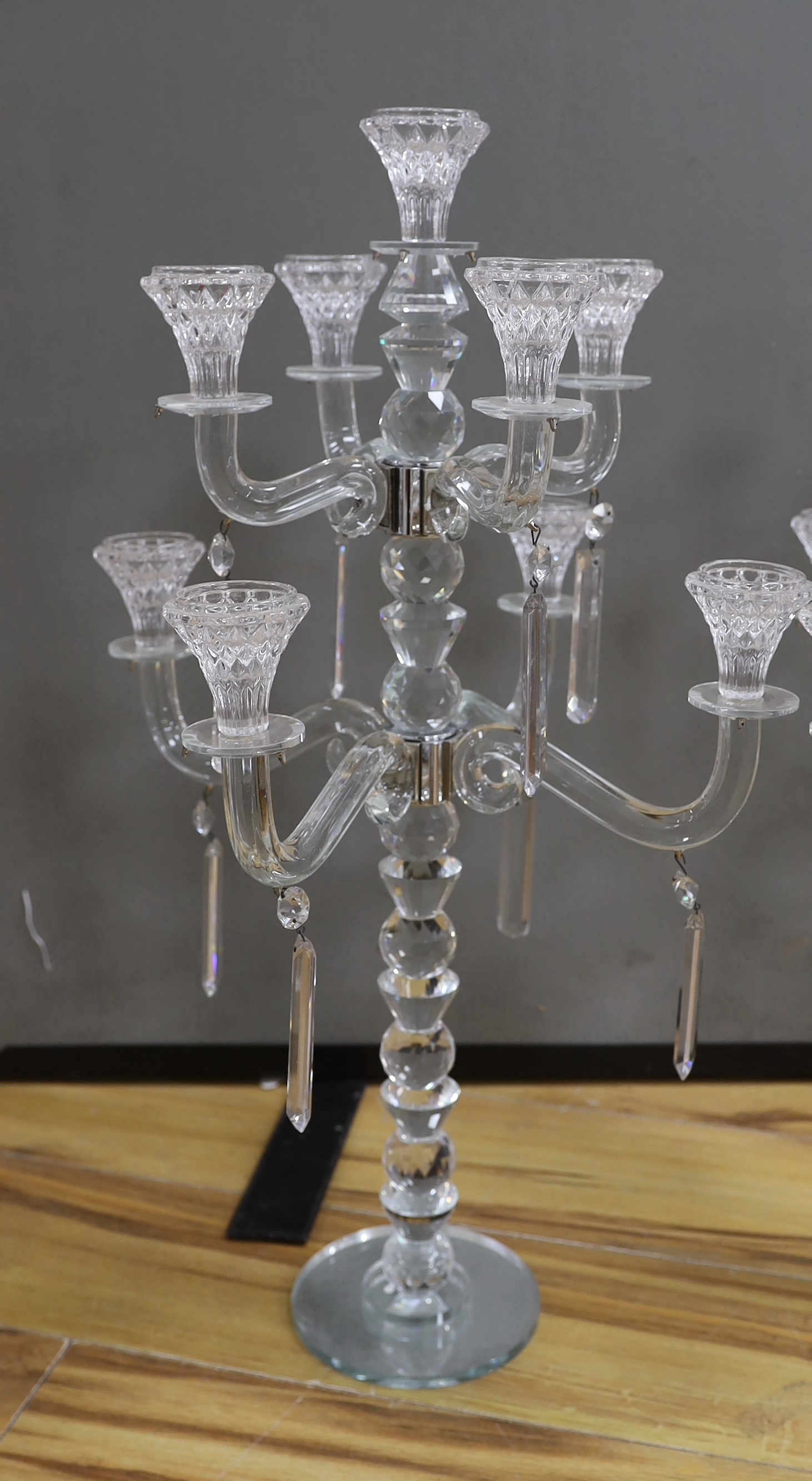 A pair of modern eight branch, nine light lustre candelabra, 63cm high